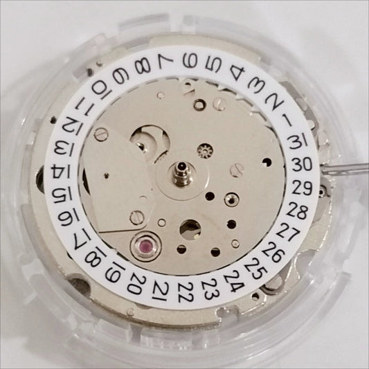 Japan Made Miyota 8217 mechanical watch movement with 3 hands, small second at 9, date at 3, precision engineered.