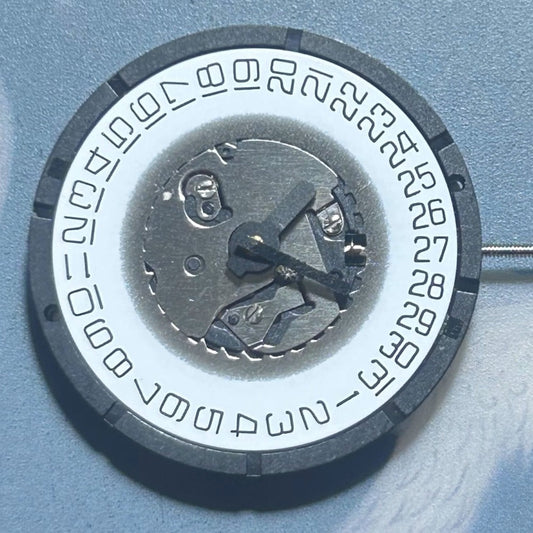 Swiss Made ISA 2331 quartz watch movement with 3 hands and date feature, ideal for repairs.