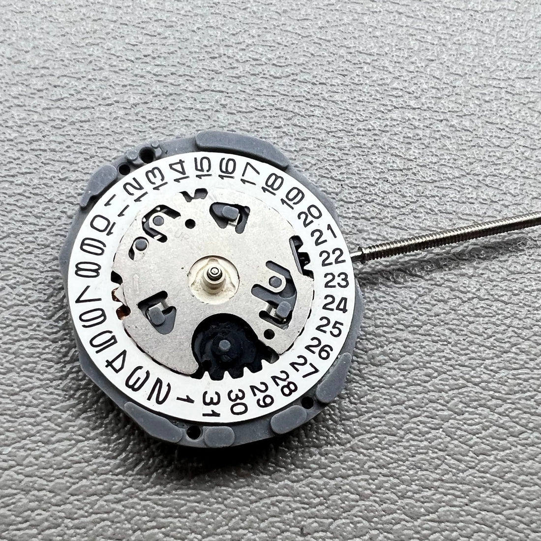 Japan Hattori Epson VJ24B quartz watch movement with date display at 3 o'clock, precise timekeeping accessory