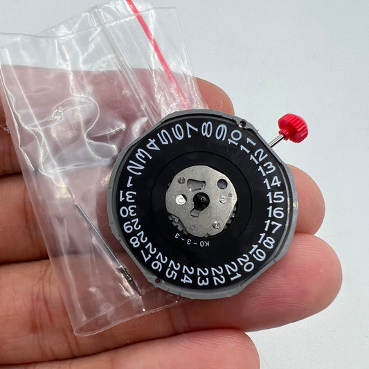 MIYOTA 2415 quartz watch movement with date at 3, black disk, original Japanese precision by Miyota.