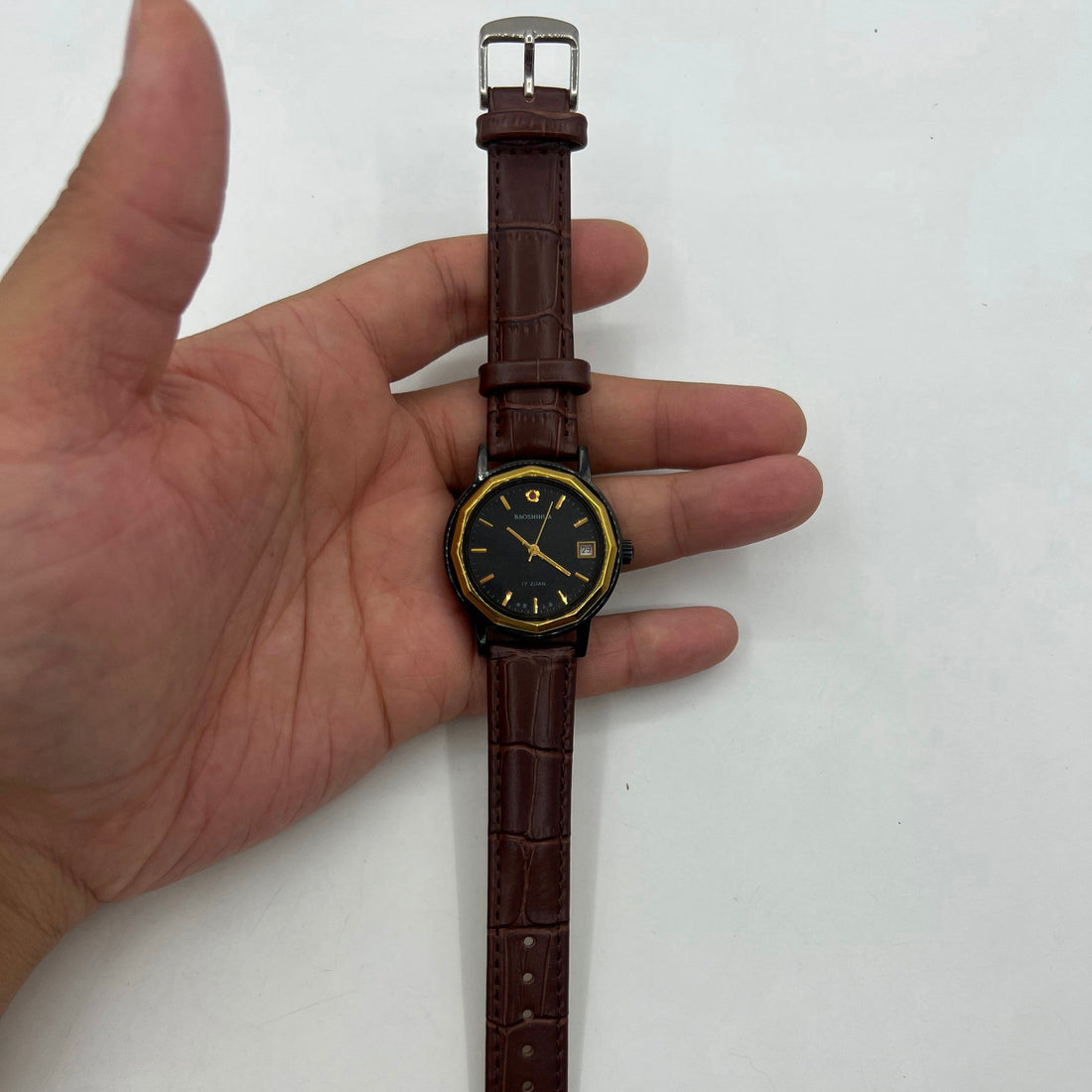 Shanghai 37mm manual mechanical watch with single calendar, black case, classic design for everyday wear.