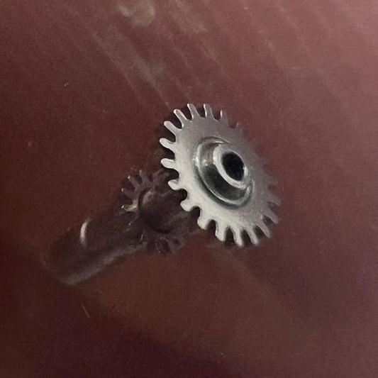 Generic 3135-335 minute pinion and cannon pinion replacement for accurate Rolex 3135 movement repair.