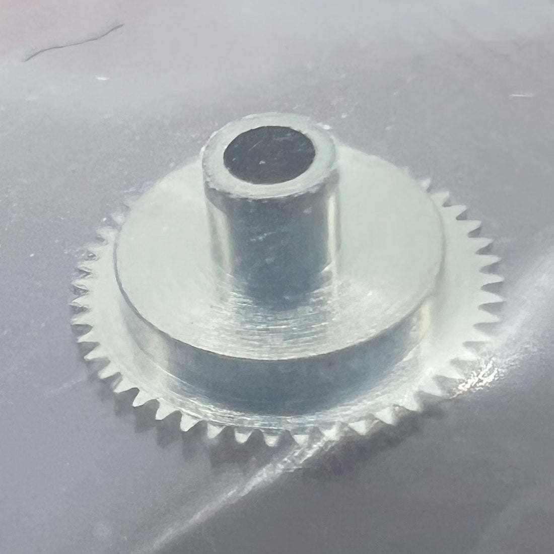 Japan made hour wheel for Miyota NH35 watch movement, precise fit for smooth timekeeping.