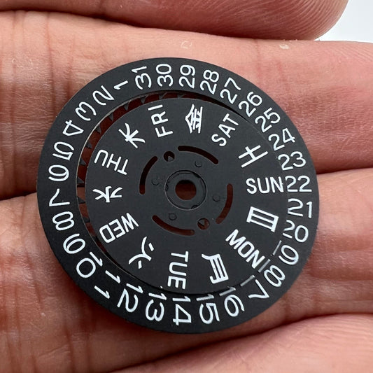 Blue lume date disk and week wheel for NH36 movement, black finish, watch accessory detail.