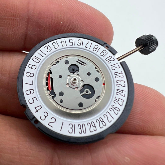 ETA 805.112 Swiss quartz watch movement with 3 hands and date at 6 o'clock, precision timekeeping.