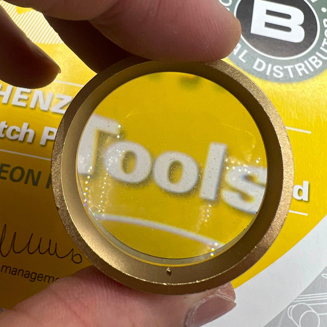 Germany-made bright golden 30X magnifier loupe, ideal for precise watch repair and jewelry inspection.