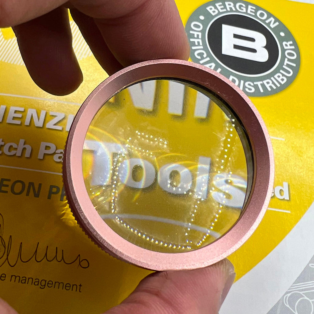 Rose gold 30X magnifier loupe by Germany Made for precise watch repair and jewelry inspection.
