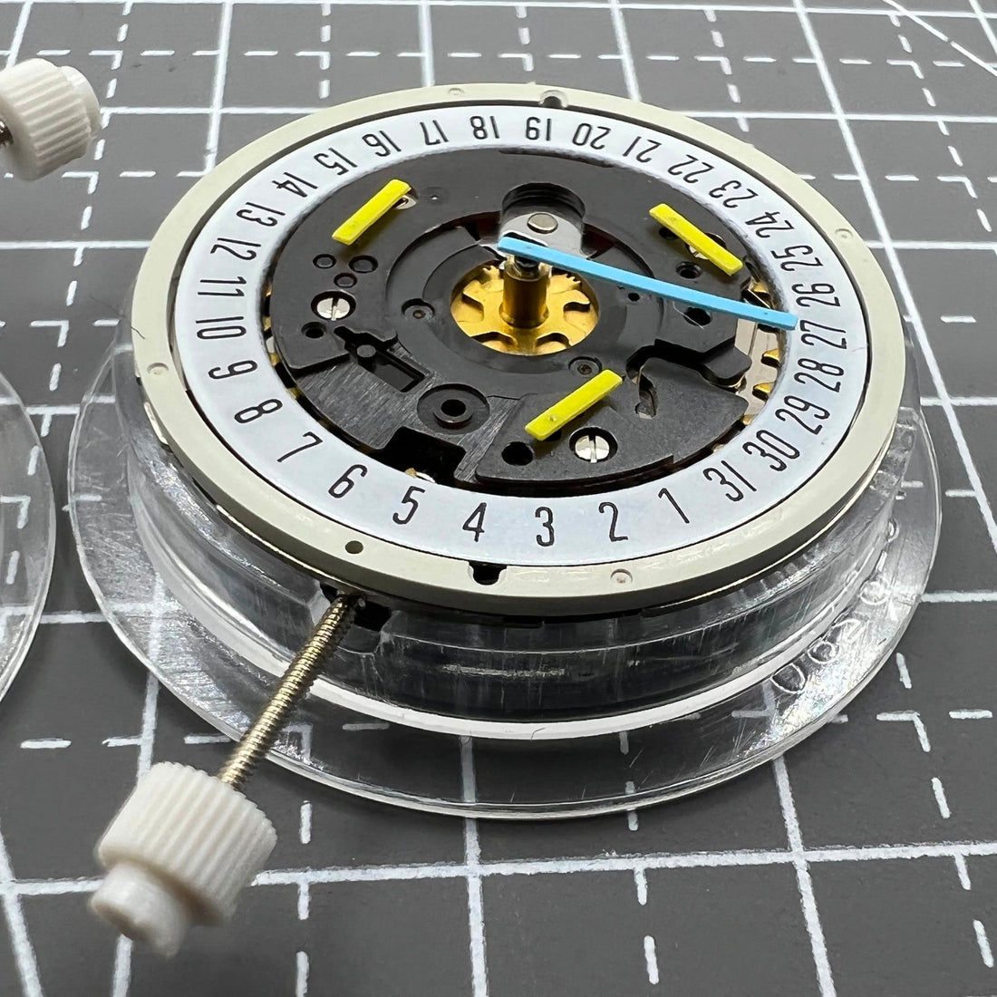 Swiss ISA 8162 quartz watch movement with date at 6, replacement for precise timekeeping.