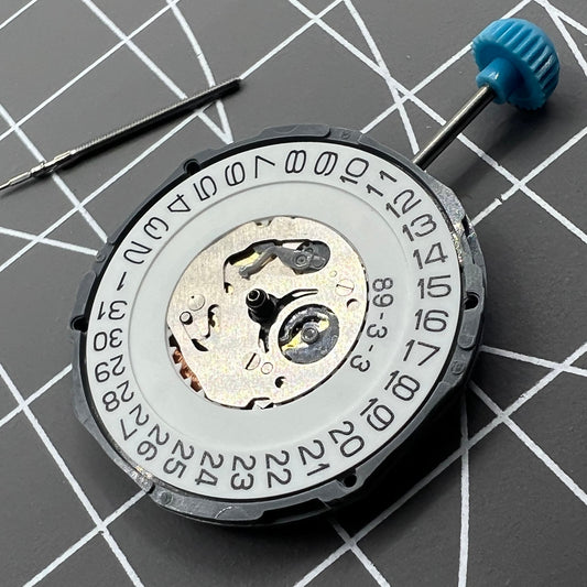 Miyota 6M12 quartz watch movement with date at 3 o'clock, 3 hands, precision Japan-made mechanism.
