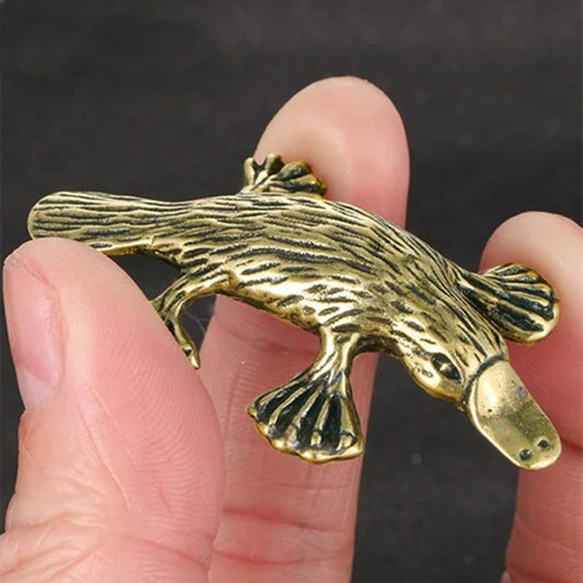 Hand-carved solid copper platypus figurine, vintage bronze finish, perfect for watch accessory display.