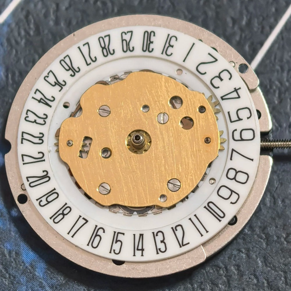 Swiss Made ETA7870 quartz watch movement with 5 hands, premium old stock part for repairs.