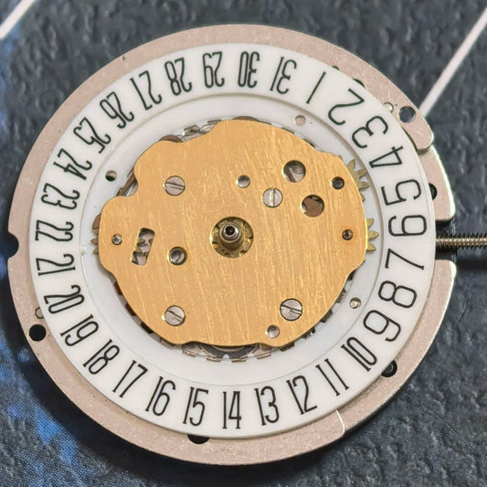 Swiss Made ETA7870 quartz watch movement with 5 hands, premium old stock part for repairs.