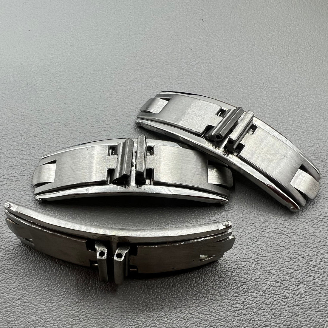 Stainless steel butterfly clasp set for ceramic watch bands, 7.6mm width, durable J12 elastic buckle by J12.