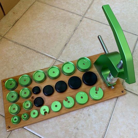 Set of #5500 pressing dies for precise watch case back fitting during repairs.