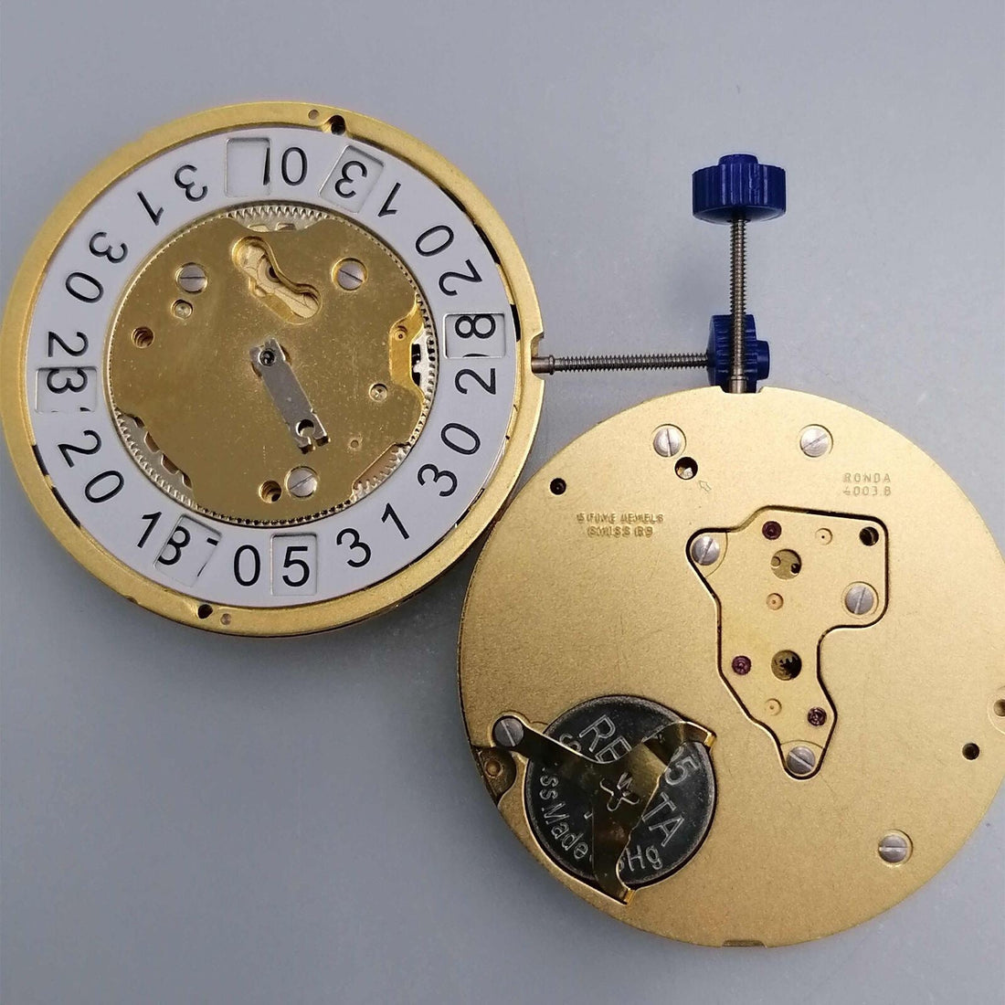 Ronda 4003B Swiss quartz watch movement with date display at 6 o?clock for precise timekeeping.