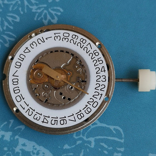 Original ETA 555.415 quartz watch movement with 3 hands and date at 3, vintage stock