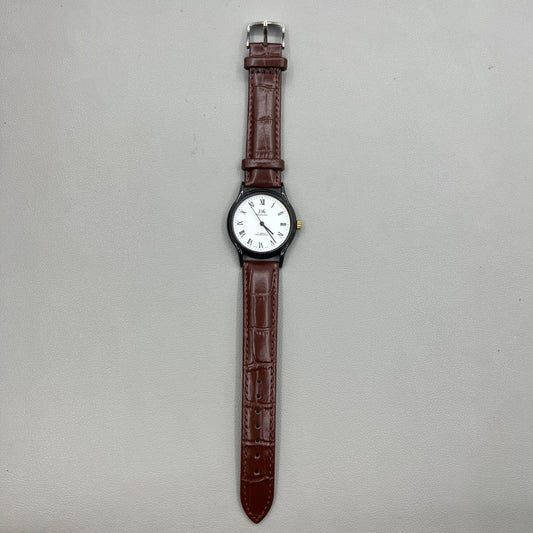 Shanghai 37mm manual mechanical watch with brown leather strap, Roman numerals, 17 jewels, classic style.