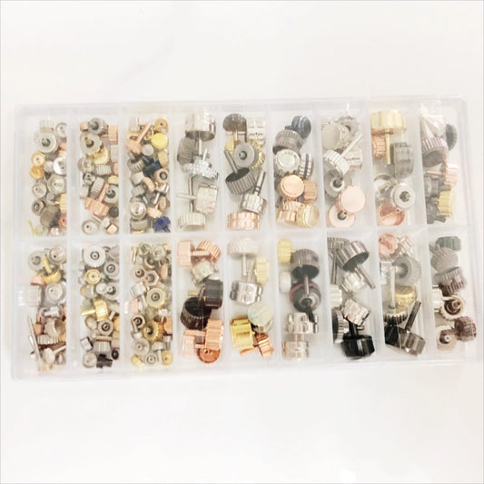 Box of 200 assorted watch crowns for repairs, featuring various sizes and styles for precision work.