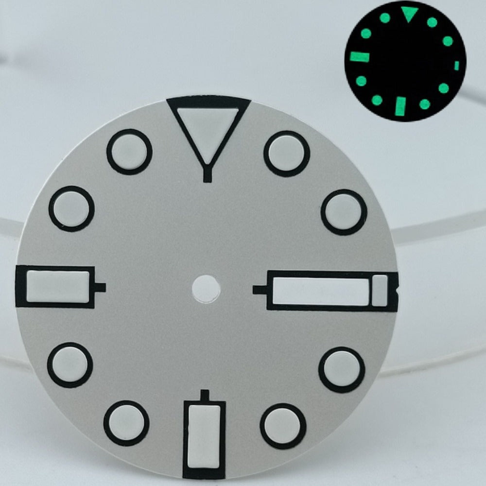 Silver 28.5mm diving watch dial with green lume, compatible with NH36 movements, metal finish.