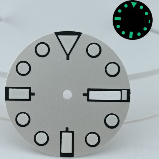 Silver 28.5mm diving watch dial with green lume, compatible with NH36 movements, metal finish.