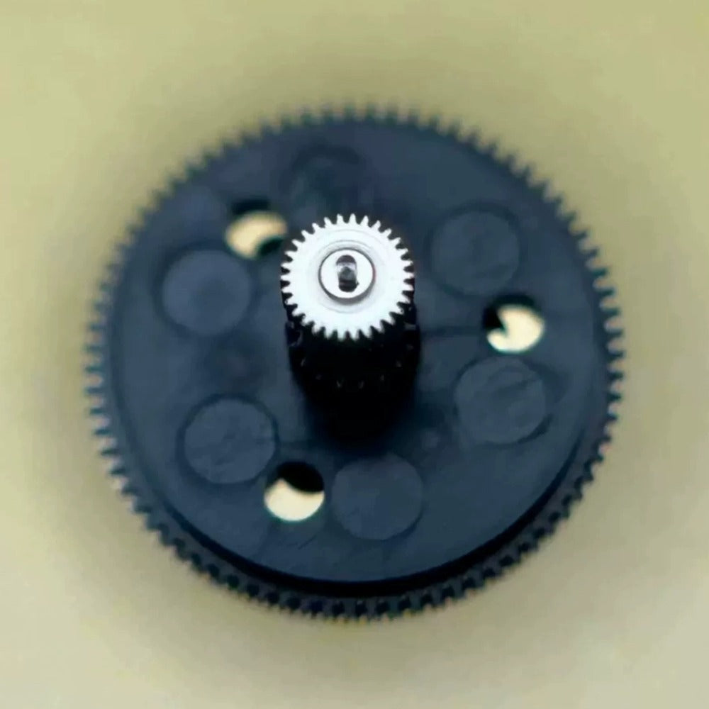 Dissembled black counting wheel for ETA C01.211 watch movement, precise watch accessory part.