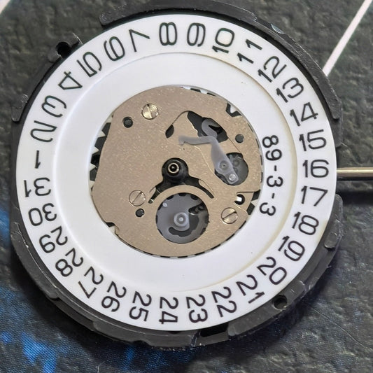 Japan Made 5F10B quartz movement watch repair part with 3 hands, precision timekeeping component.