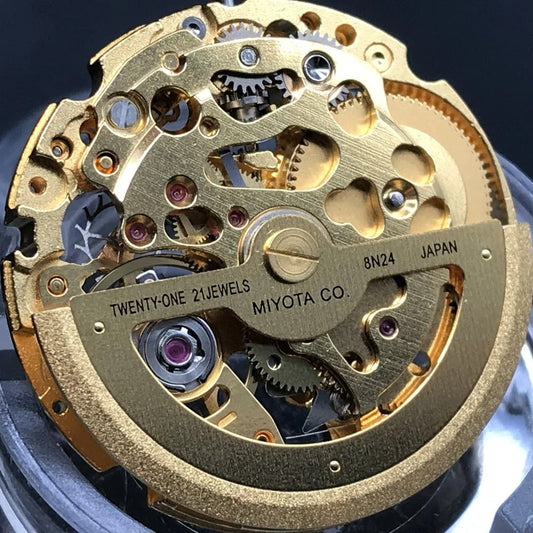 Miyota Golden+Silver 8N24 automatic watch movement showcasing precise Japanese craftsmanship.