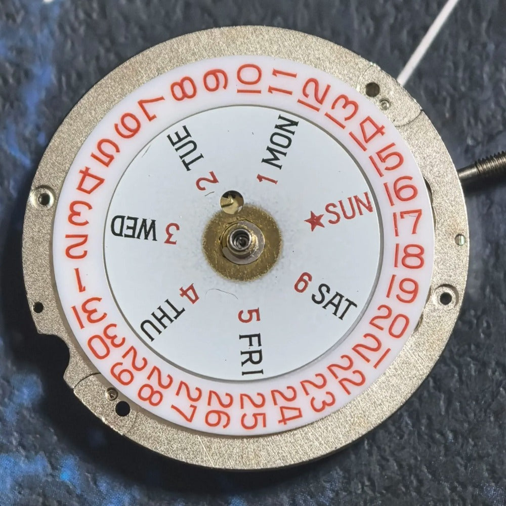 Swiss Made ETA CAL1219 watch with mechanical movement, double calendar, and red font detailing