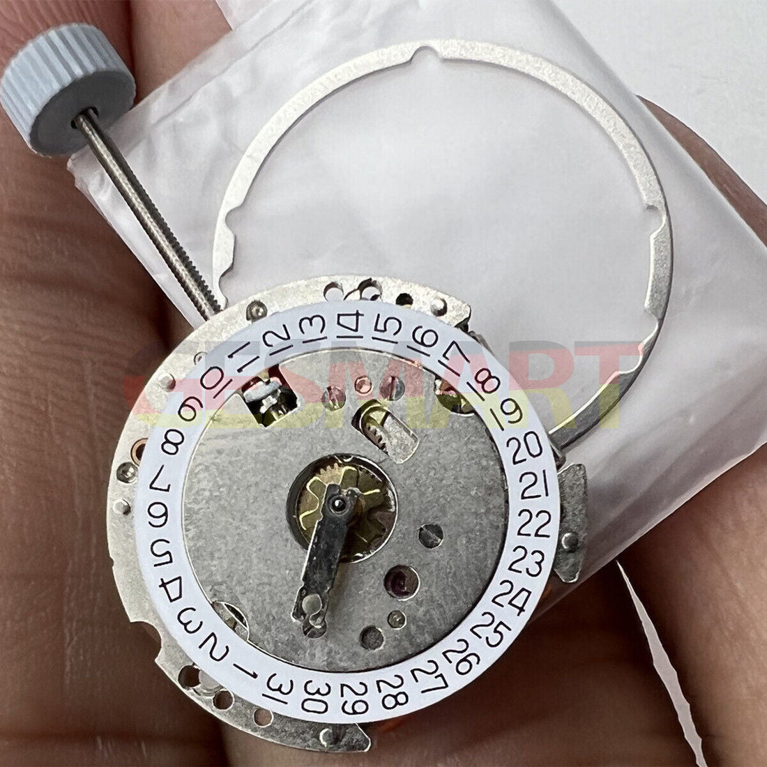 Ronda 775 Swiss quartz watch movement with date display at 3 o'clock, precision timing mechanism