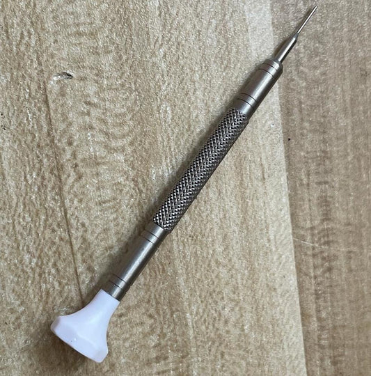 Precision Omega Constellation ladies watch maker screwdriver for delicate accessory repairs.
