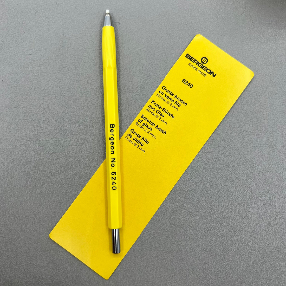Swiss Tool Bergeon 6240 glass fiber scratch brush for precise watch glass polishing.