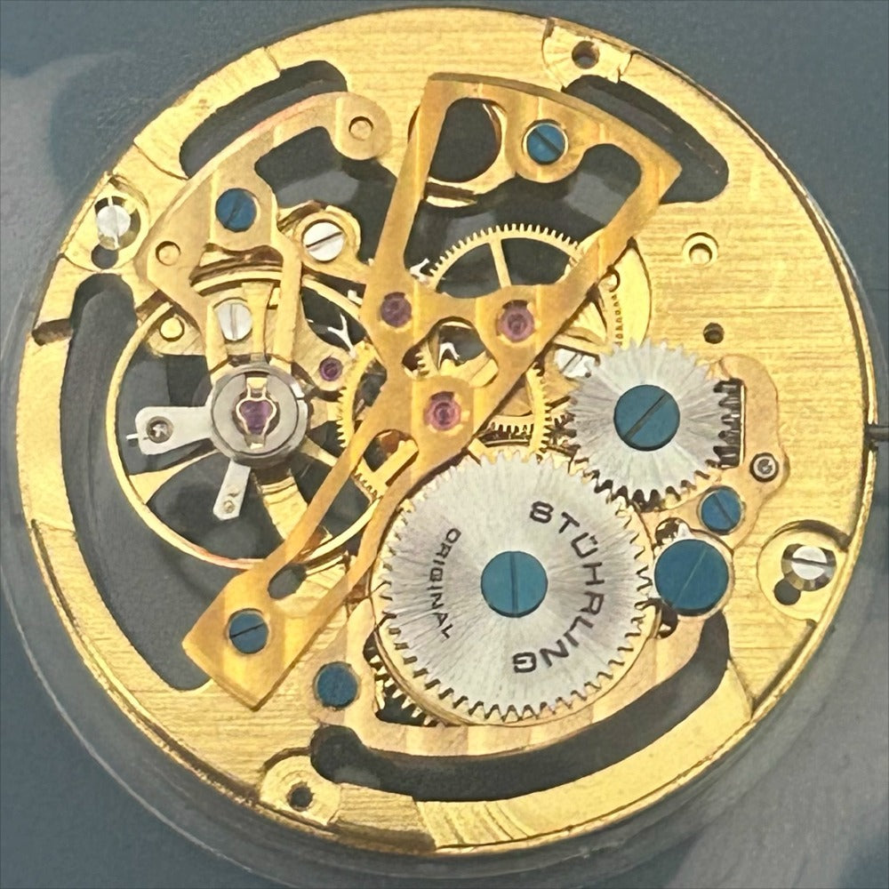Golden hollow hand winding mechanical movement watch repair part, precision craftsmanship, China made.