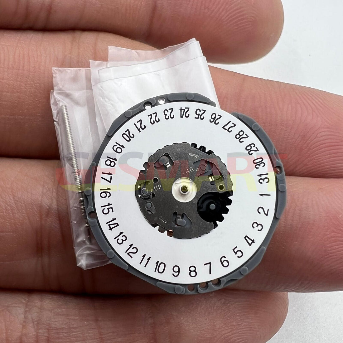 Hattori Epson TMI VJ32 quartz watch movement with date function at 3/6, precision Japanese craftsmanship