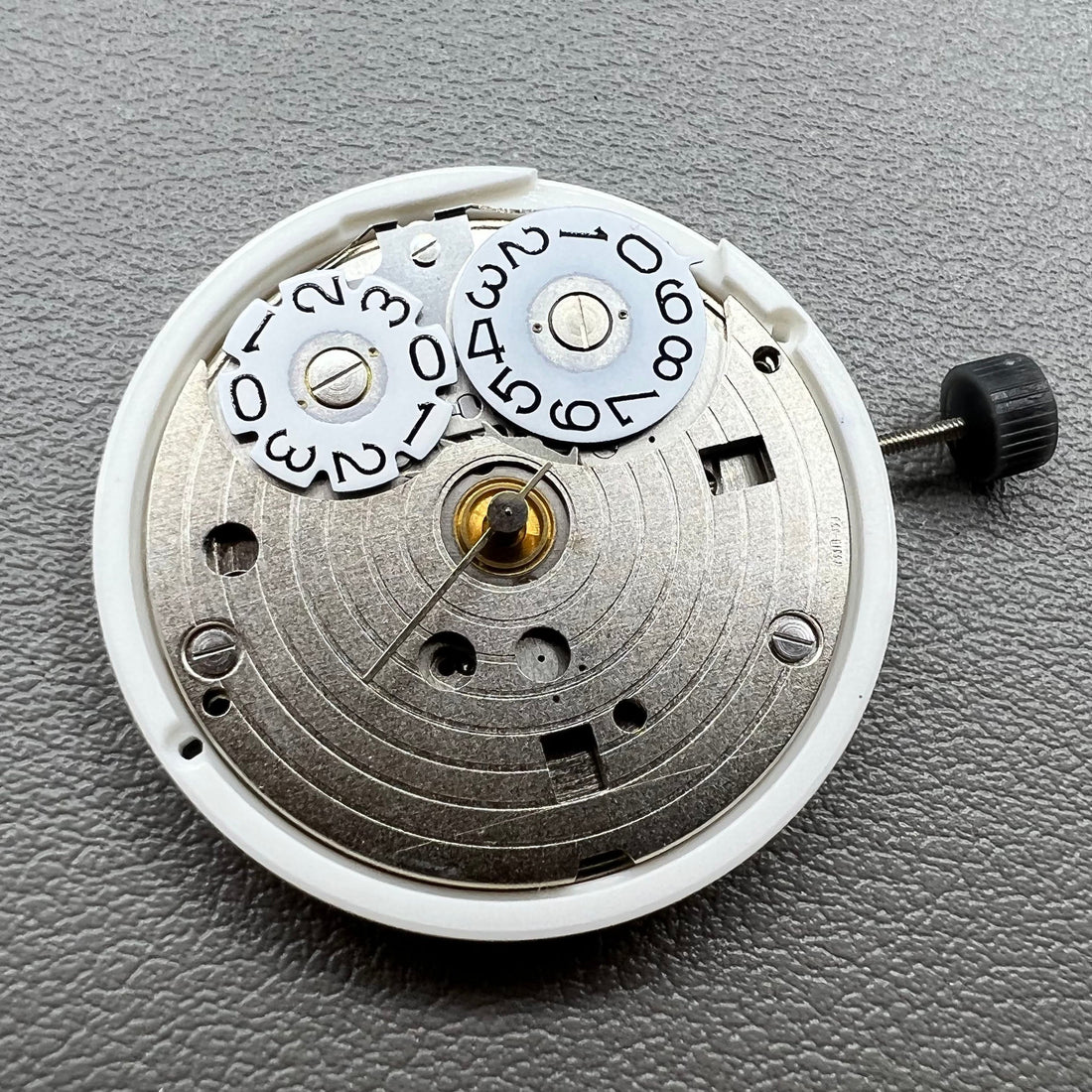 FE 7531 quartz movement with 3 hands, precision replacement part for watches.