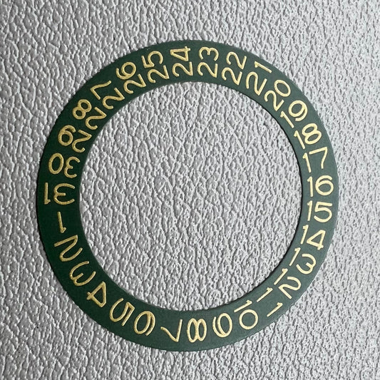 Dark green watch face with hunter date display, flax yellow numerals, Miyota NH35 NH36 movement.