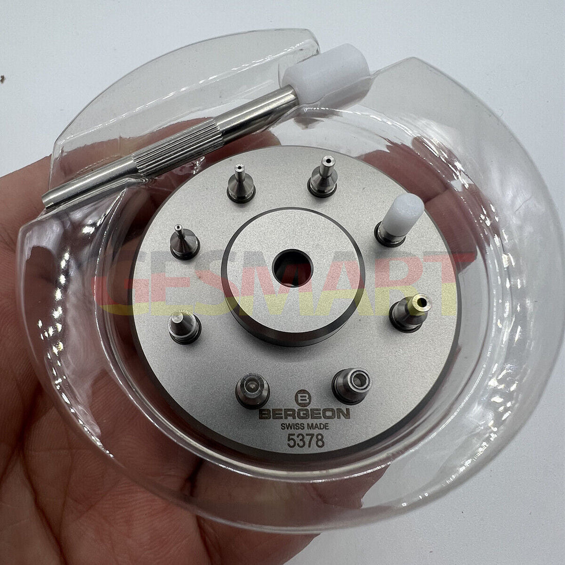 Bergeon 5378 Swiss watch hand fitting tool with 9 stakes on holder for precise accessory adjustments