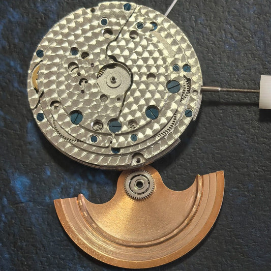 Silver Shanghai S-05A watch with rose gold automatic rotor, mechanical movement by China Made for watch accessories.