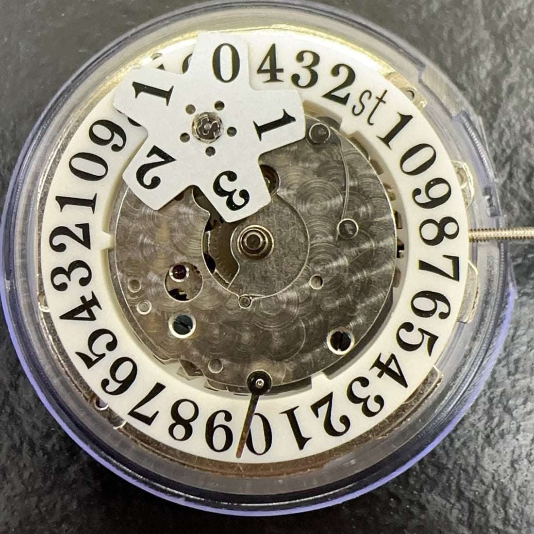 China Made 2240 automatic mechanical watch part with single calendar and 2 hands, precision movement component.