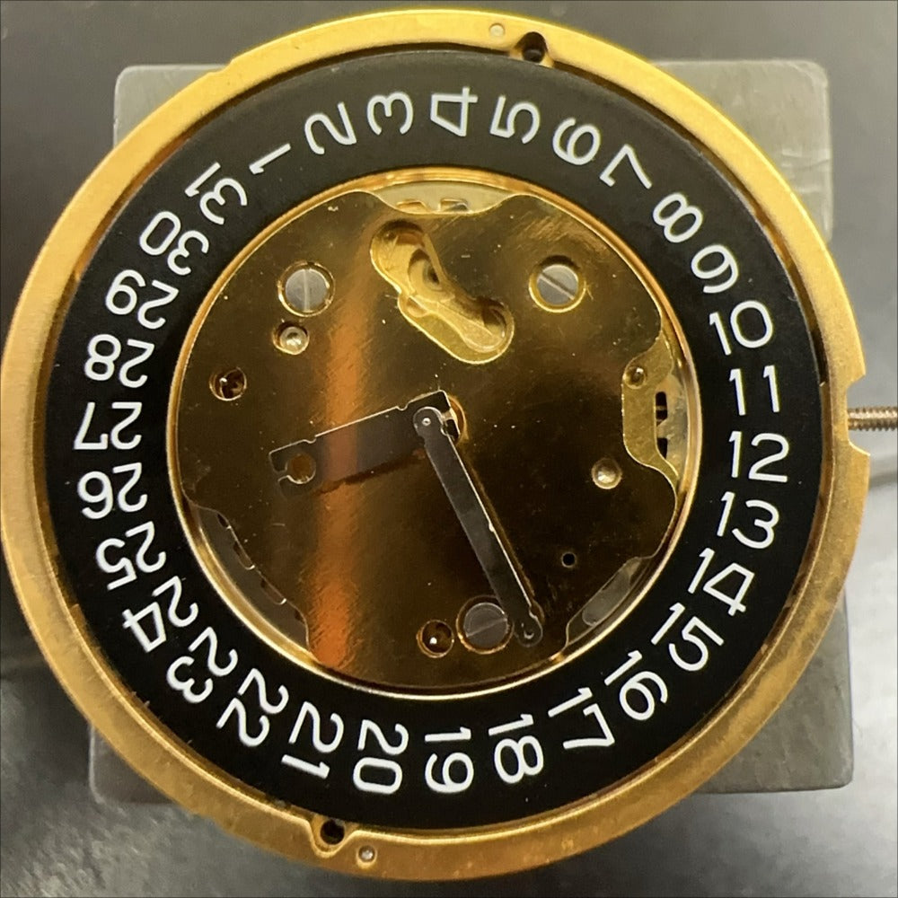 Swiss Made Ronda 5030D quartz movement with black date disk at 4 o'clock for watch repair.
