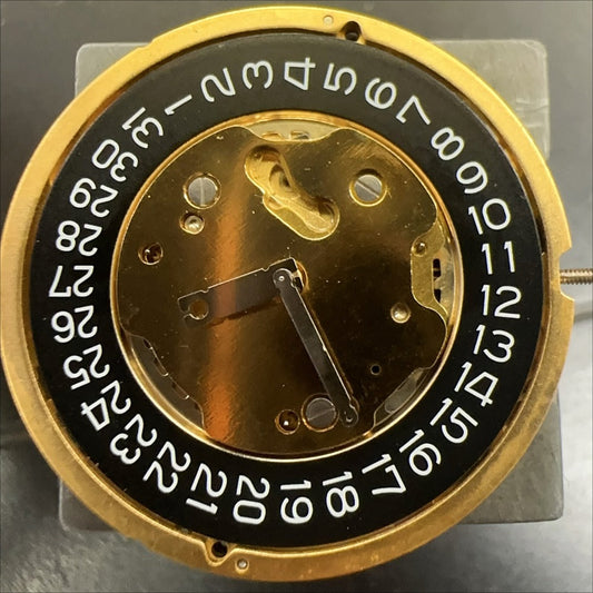 Swiss Made Ronda 5030D quartz movement with black date disk at 4 o'clock for watch repair.