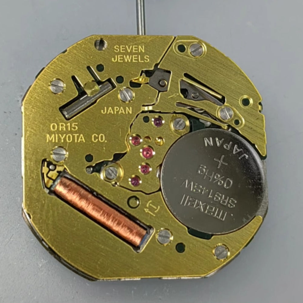 Japan Made Miyota OR15 quartz watch part showing precise movement mechanism for accurate timekeeping.