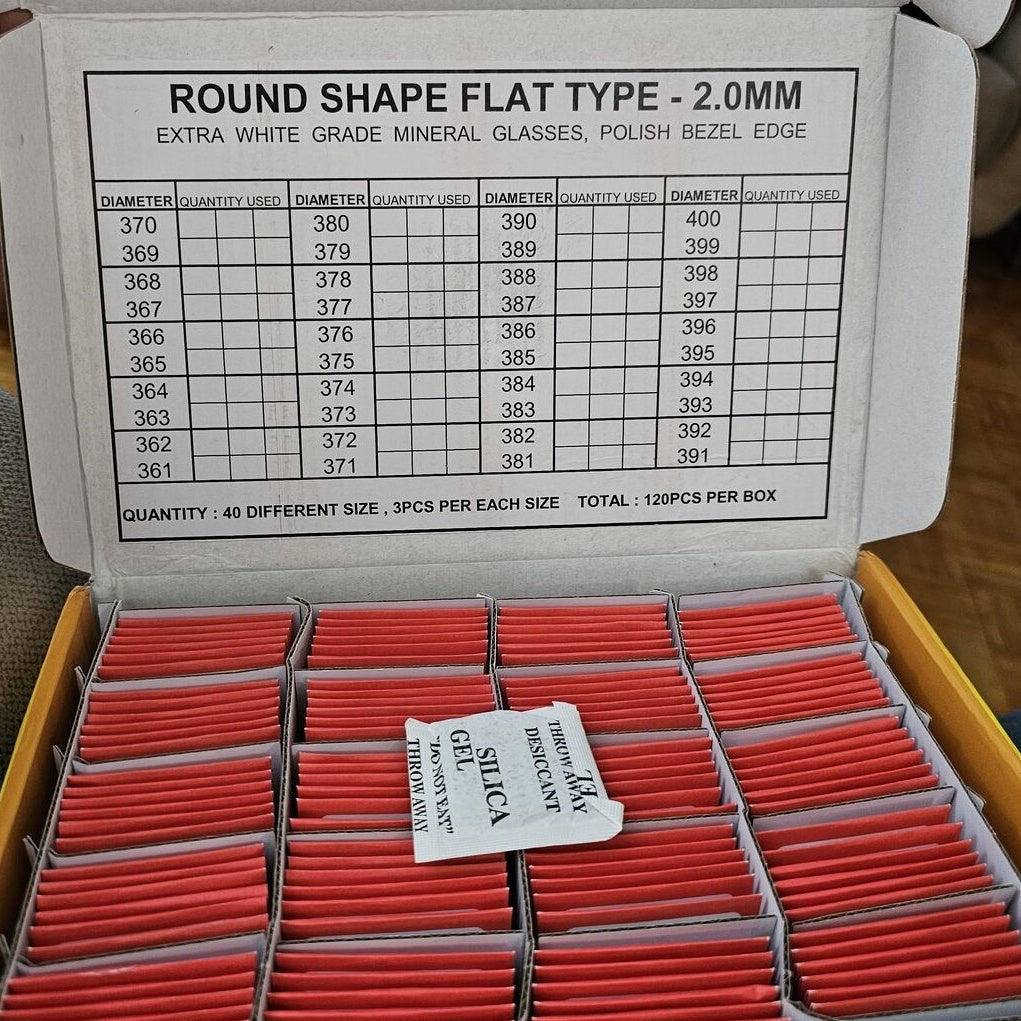 Set of 120 flat 2.0mm thick round watch glass crystals, 36.1-40mm, for precise watch repair and replacement.