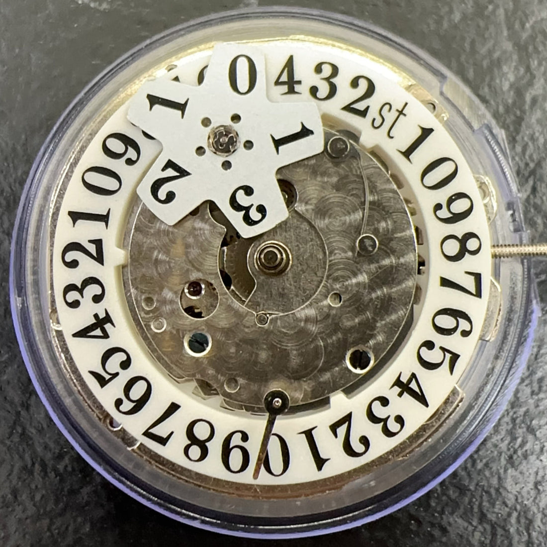 China Made 2242 Automatic watch movement with single calendar and small second hand for precise timekeeping.