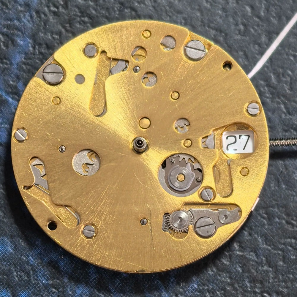 Swiss Made ISA 9232 quartz watch movement with 6 hands, date at 3, small seconds at 6/9/12 for precision timing.