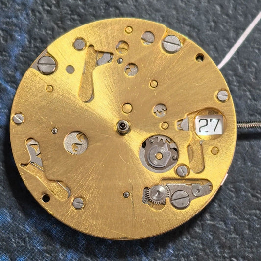 Swiss Made ISA 9232 quartz watch movement with 6 hands, date at 3, small seconds at 6/9/12 for precision timing.
