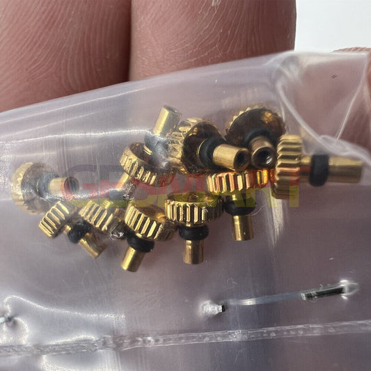 Golden watch crown replacement for Orient watch movement, ideal for precise repairs and restoration.