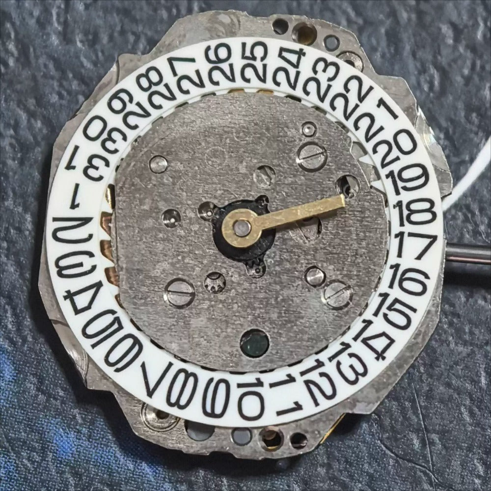Japan Made Miyota 4T74 quartz watch movement with 2 hands and date display at 3 o'clock.