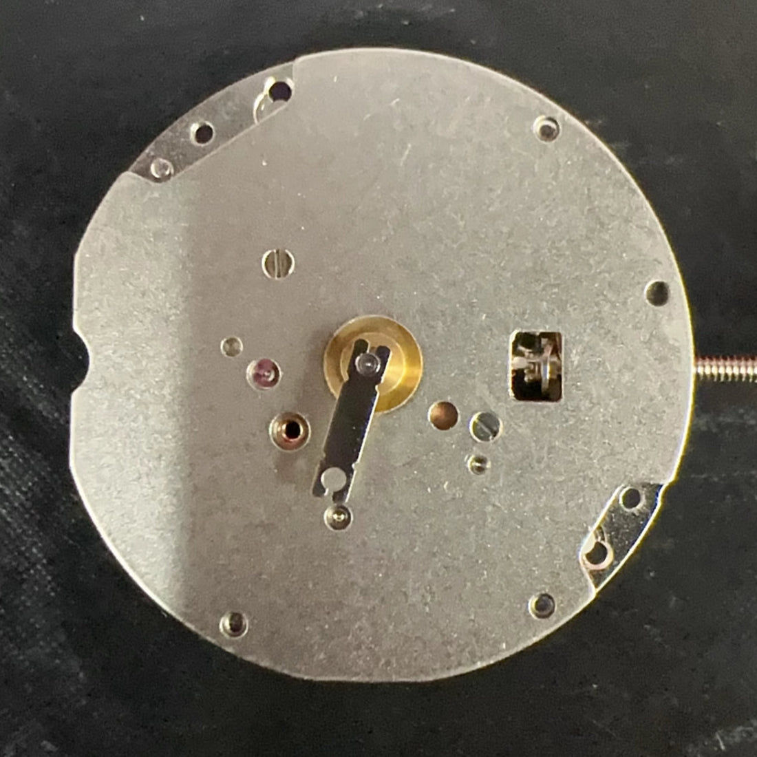 Swiss Part silver Ronda 782 quartz movement with 2 hands, no calendar, for precise watch repair.
