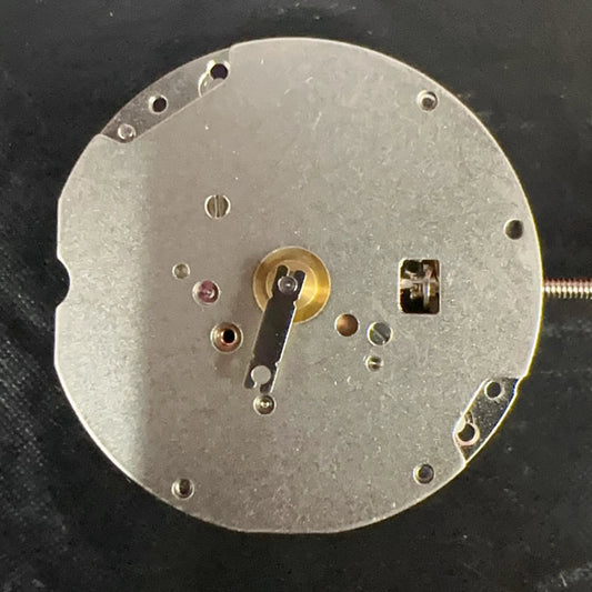Swiss Part silver Ronda 782 quartz movement with 2 hands, no calendar, for precise watch repair.
