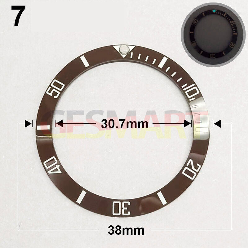 38mm ceramic brown watch bezel with silver font and green luminous details for precise timekeeping.